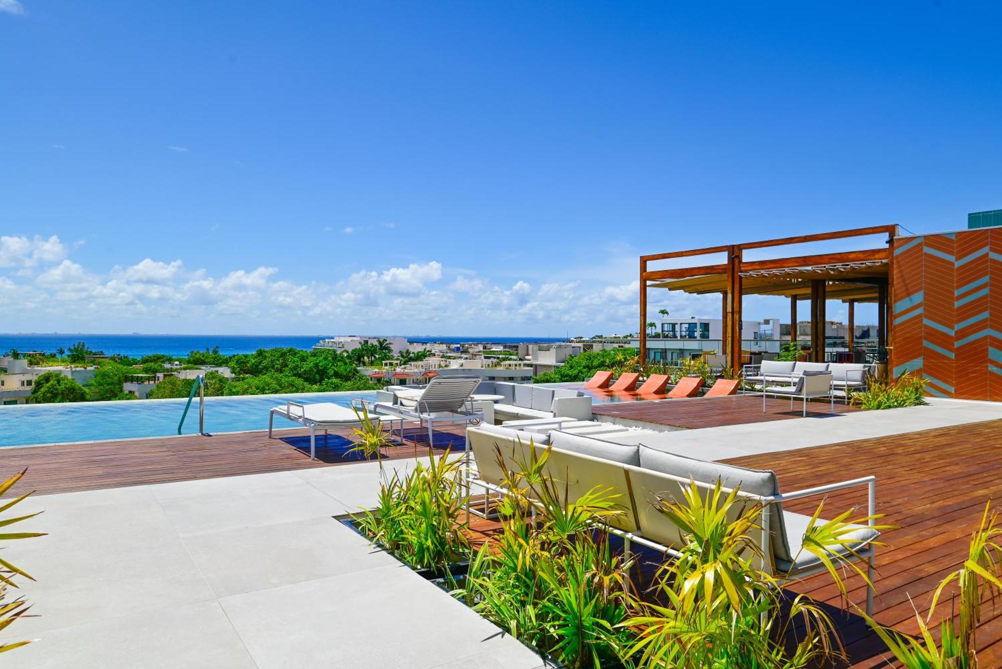 ホテル Aloft プレヤデルカーメン エクステリア 写真 Rooftop pool at the Grand at Moon Palace